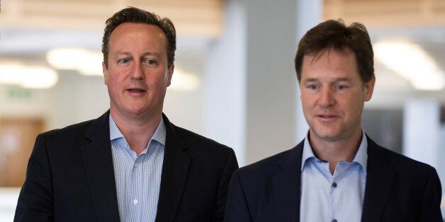 Prime Minister David Cameron (left) and Deputy Prime Minister Nick Clegg during a visit to Pentland Brands plc headquarters in north London.