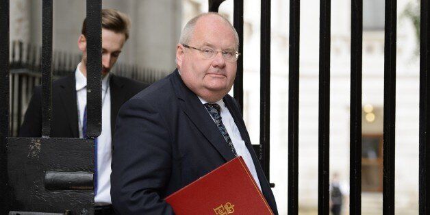 British Communities and Local Government Secretary Eric Pickles arrives in Downing Street, central London, on August 20, 2014, ahead of a meeting to discuss the ongoing crisis involving the Islamic State radical group. British Prime Minister David Cameron broke off his holiday on August 20 for talks on the threat posed by Islamic State jihadists following the 'shocking and depraved' apparent beheading of US journalist James Foley. AFP PHOTO / LEON NEAL (Photo credit should read LEON NE