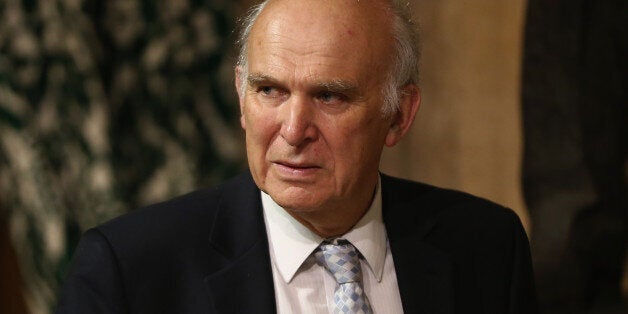 LONDON, ENGLAND - JUNE 04: British Business Secretary Vince Cable stands in the Members' Lobby before the Queen's Speech at the State Opening of Parliament on June 4, 2014 in London, England. Queen Elizabeth II unveiled the coalition government's legislative programme in a speech delivered to Members of Parliament and Peers in The House of Lords. Proposed legislation is expected to be introduced on a 5p charge for plastic bags in England, funding of workplace pensions, new state-funded childca