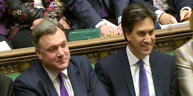 Shadow Chancellor Ed Balls (left) and Labour party leader Ed Miliband during Prime Minister's Questions in the House of Commons, London.