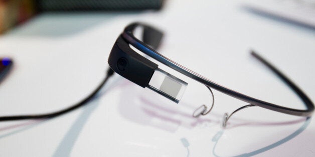 A pair of Google Glass connected glasses sits on display on day three of the Mobile World Congress in Barcelona, Spain, on Wednesday, Feb. 26, 2014. Top telecommunication managers will rub shoulders in Barcelona this week at the Mobile World Congress, Monday, Feb. 24 - 27, a traditional venue for showcasing the latest products for dealmaking. Photographer: Angel Navarrete/Bloomberg via Getty Images