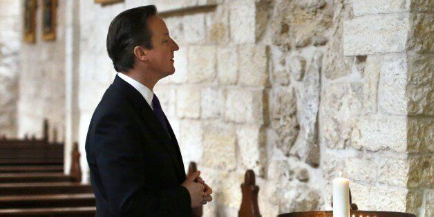 British Prime Minister David Cameron visits the Church of the Nativity in the West Bank town of Bethlehem, on March 13, 2014. AFP PHOTO / POOL/ THOMAS COEX (Photo credit should read THOMAS COEX/AFP/Getty Images)
