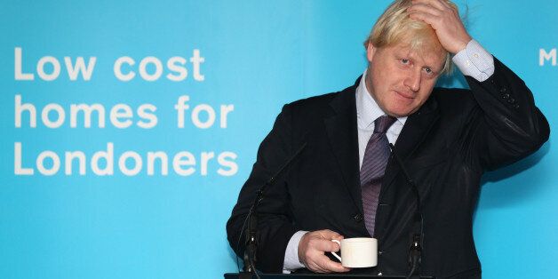 LONDON, ENGLAND - NOVEMBER 25: Boris Johnson, the Mayor of London, delivers a speech after pouring concrete at the construction site of the 'Greenwich Square' housing development on November 25, 2013 in London, England. Mr Johnson assisted the residential building work, approximately half of which will be low-cost rent or buy accommodation, as he launched his new draft Housing Strategy for the capital. The Mayor aims to address issues around London's rapidly increasing housing needs and in part
