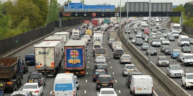 Motorists queue in heavy traffic on the M25 between junction 12 and 13 as the Easter getaway starts