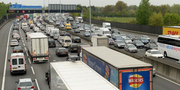 Motorists queue in heavy traffic on the M25 between junction 12 and 13 as the Easter getaway starts.