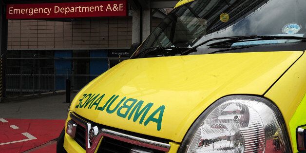 File photo dated 07/04/11 of an ambulance outside the entrance to an Accident & Emergency department as the ambulance service is on the verge of "breaking down" because staff are suffering high levels of stress amid long working hours and tight targets, according to a new report.