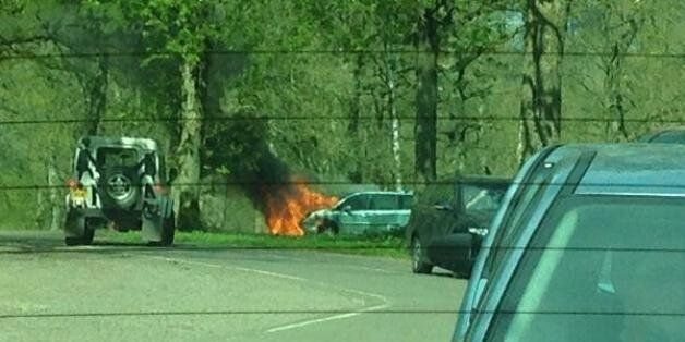 A mother and her two children had to abandon their car as it overheated and caught fire at Longleat Safari Park