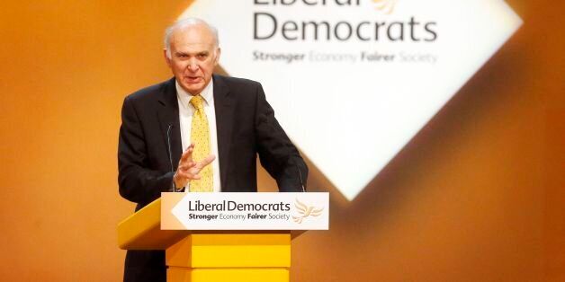 Business Secretary Vince Cable addresses delegates during day three of the Liberal Democrats autumn conference at the Clyde Auditorium in Glasgow, Scotland.