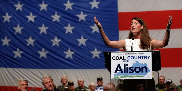 US Senate Democratic candidate and Kentucky Secretary of State Alison Lundergan Grimes speaks at a campaign event with former US President Bill Clinton on August 6, 2014