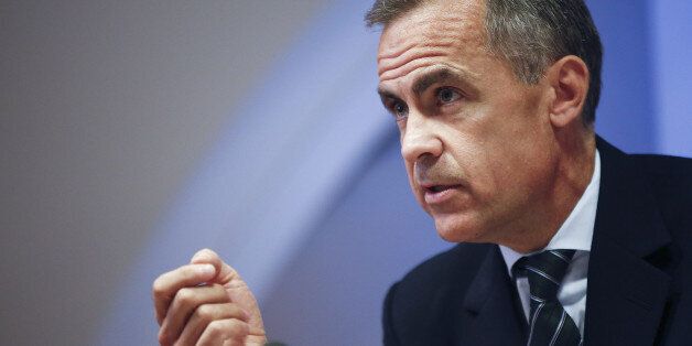 Mark Carney, governor of the Bank of England, gestures during the bank's quarterly inflation report news conference in London, U.K., on Wednesday, Aug. 13, 2014. Carney pledged that Bank of England officials won't rush to raise interest rates as he highlighted overseas risks to Britain's recovery and the weakness of wages. Photographer: Simon Dawson/Bloomberg via Getty Images