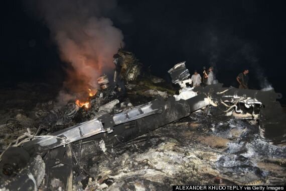 MH17 Crash: Passenger Was Wearing Oxygen Mask, Dutch Investigators ...