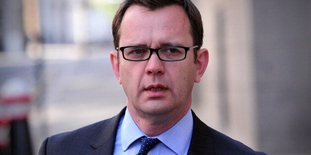 Former News of the World editor and Downing Street communications chief Andy Coulson arrives at the Old Bailey court in central London on April 16, 2014 as he continues to give evidence in the phone-hacking trial. Coulson is among seven defendents on trial over alleged phone hacking at the defunct News of the World newspaper and related charges. All defendents deny the charges. AFP PHOTO / CARL COURT (Photo credit should read CARL COURT/AFP/Getty Images)