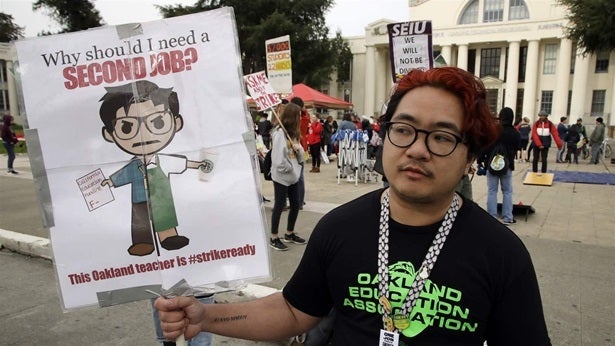 <p>Oakland Technical High School teacher Cris Bautista shares an apartment an hour away from his school and works another job because of high housing costs. Housing prices are increasingly driving people to smaller, more affordable cities.</p>