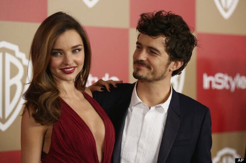 miranda kerr red dress golden globes Miranda Kerr Plunging Halter Neck Burgundy Red Carpet Dress Golden Globes  2013