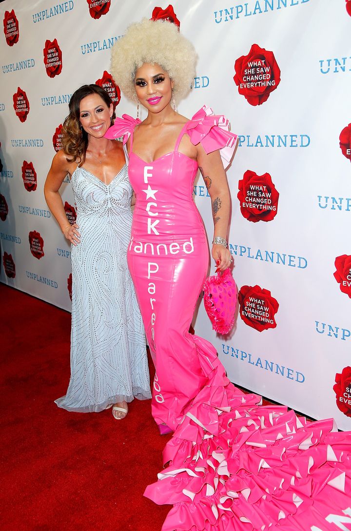Ashley Bratcher, star of "Unplanned," with Joy Villa, wearing a "Fuck Planned Parenthood" dress, at the "Unplanned" premiere on March 18.