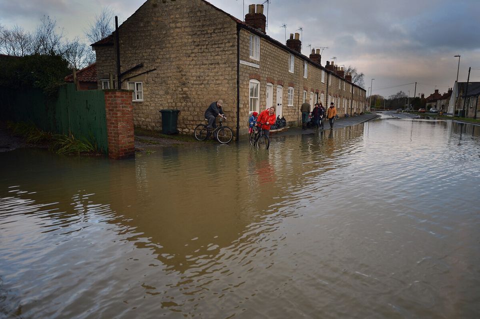Residents Deal With Flooding Aftermath