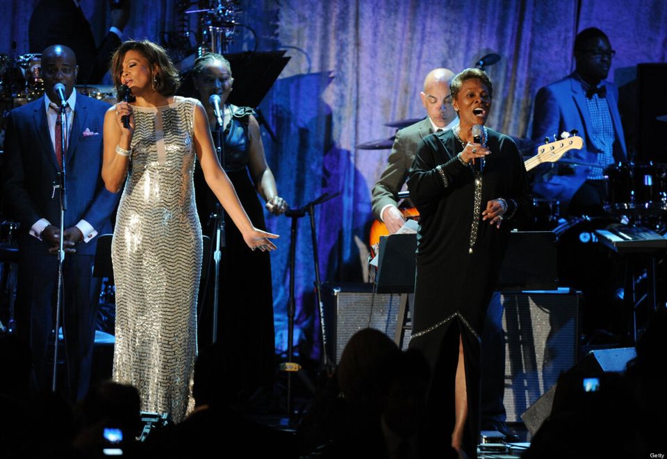 Singers Whitney Houston (L) and Dionne W