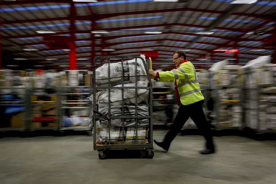 Postal Workers At The Medway Mail Centre Sort Christmas Post During Their Busiest Week Of The Year
