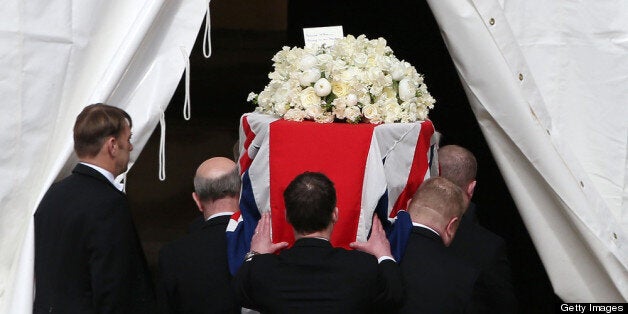 LONDON, ENGLAND - APRIL 16: The coffin of former Prime Minister Margaret Thatcher arrives at the Houses of Parliament ahead of her funeral on April 16, 2013 in London, England. Lady Thatcher's coffin will rest inside the Chapel Of St Mary Undercroft overnight before a ceremonial funeral service is held at St Paul's Cathedral tomorrow. (Photo by Peter Macdiarmid/Getty Images)