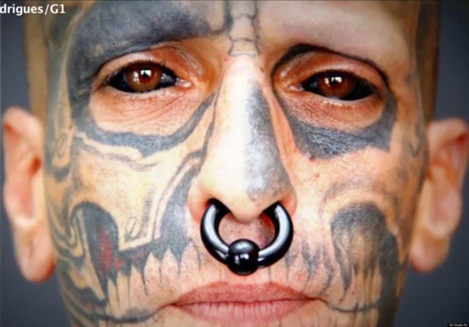 Tattoo Artist Covers Body With Black Ink Including Eyeballs and Inside of  His Mouth