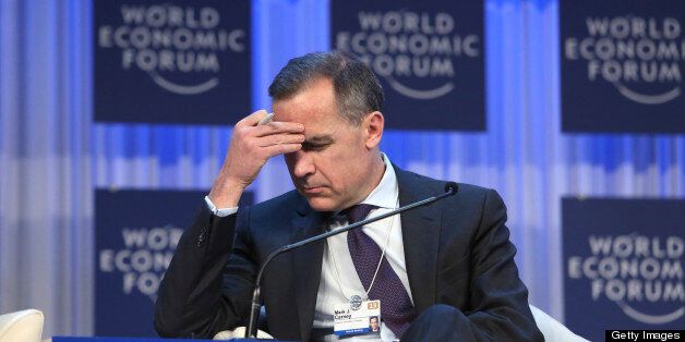Mark J. Carney, then governor of the central bank of Canada, pauses during a session on the final day of the World Economic Forum