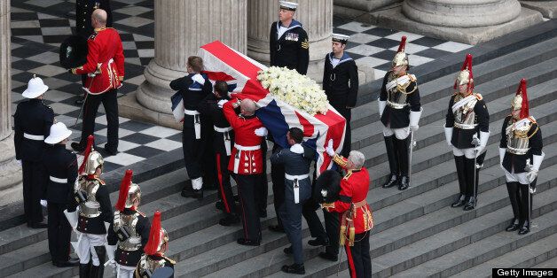 LONDON, ENGLAND - APRIL 17: Members of the Armed Services carry the coffin during the Ceremonial funeral of former British Prime Minister Baroness Thatcher at St Paul's Cathedral on April 17, 2013 in London, England. Dignitaries from around the world today join Queen Elizabeth II and Prince Philip, Duke of Edinburgh as the United Kingdom pays tribute to former Prime Minister Baroness Thatcher during a Ceremonial funeral with military honours at St Paul's Cathedral. Lady Thatcher, who died last week, was the first British female Prime Minister and served from 1979 to 1990. (Photo by Oli Scarff/Getty Images)