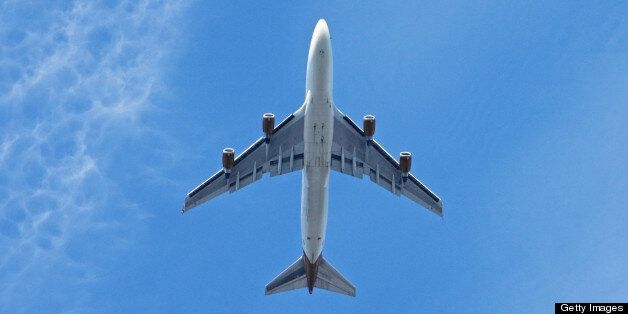 Jumbo jet in blue sky