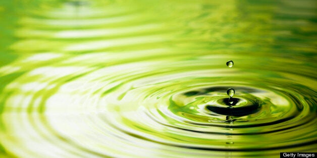 Freeze frame photography of drops falling into water. As is - some clean up only.