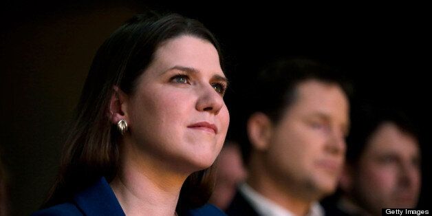 BRIGHTON, ENGLAND - MARCH 08: Women and equalities minister Jo Swinson listens to a speech during the opening day of the Liberal Democrat spring party conference on March 8, 2013 in Brighton, England. The conference opens in the wake of several scandals within the party, but also after a successful by-election campaign in the constituency of Eastleigh. (Photo by Matthew Lloyd/Getty Images)