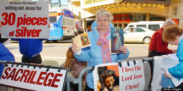 UNITED STATES - MAY 21: Ann Marie McGuire joins other demonstrators as they protest the movie 'The Da Vinci Code' outside the AMC Empire 25 theater at W. 42nd St. and Eighth Ave. (Photo by Andrew Savulich/NY Daily News Archive via Getty Images)