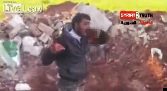 Syrian Rebel Leader Abu Sakkar Filmed Cutting Out And 'Eating' Soldier ...