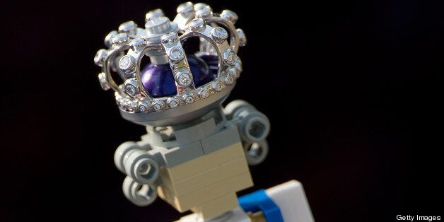 A 10cm high lego figure of Britain's Queen Elizabeth II, complete with a real diamond-encrusted crown, is pictured at the Legoland theme park in Windsor, west of London, on May 24, 2012. The Queen's Diamond Jubilee will take place June 2-5, 2012, and celebrations will include a festival of boats on the river Thames and the lighting of more than 2,000 beacons around the country during a four-day public holiday. AFP PHOTO / ADRIAN DENNIS (Photo credit should read ADRIAN DENNIS/AFP/GettyImages)