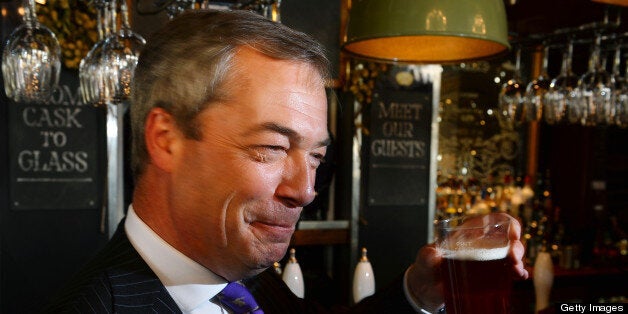 UK Independent Party (UKIP) leader Nigel Farage enjoys a pint of beer in a pub in central London on May 3, 2013. The anti-immigration UK Independence Party (UKIP) was celebrating some of its best ever results following local elections which delivered a bloody nose to Britain's ruling coalition. AFP PHOTO/BEN STANSALL (Photo credit should read BEN STANSALL/AFP/Getty Images)