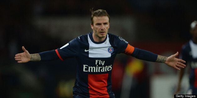 PARIS, FRANCE - MAY 18: David Beckham of PSG in action during the Ligue 1 match between Paris Saint-Germain FC and Stade Brestois 29 at Parc des Princes on May 18, 2013 in Paris, France. (Photo by Michael Regan/Getty Images)