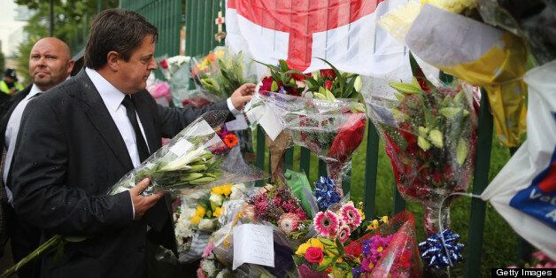 British National Party (BNP) leader Nick Griffin arrives to lay flowers close to the scene where Drummer Lee Rigby of the 2nd Battalion the Royal Regiment of Fusiliers was killed