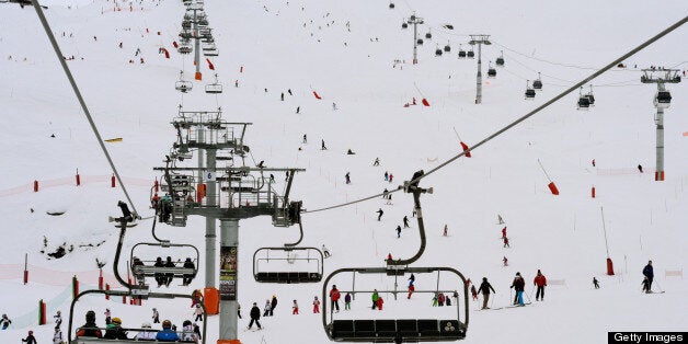 People enjoy the slopes at the French ski resort of Meribel in the French Alps on March 7, 2013. AFP PHOTO / PHILIPPE DESMAZES (Photo credit should read PHILIPPE DESMAZES/AFP/Getty Images)