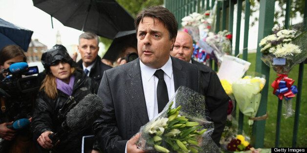 LONDON, ENGLAND - MAY 24: British National Party (BNP) leader Nick Griffin arrives to lay flowers close to the scene where Drummer Lee Rigby of the 2nd Battalion the Royal Regiment of Fusiliers was killed, on May 24, 2013 in London, England. Drummer Lee Rigby of the 2nd Battalion the Royal Regiment of Fusiliers was murdered by suspected Islamists near London's Woolwich Army Barracks. The UK's security services are facing a Commons inquiry after confirmation that the two men arrested were known to MI5. (Photo by Dan Kitwood/Getty Images)