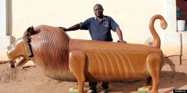 Paa Joe and his trademark lion coffin