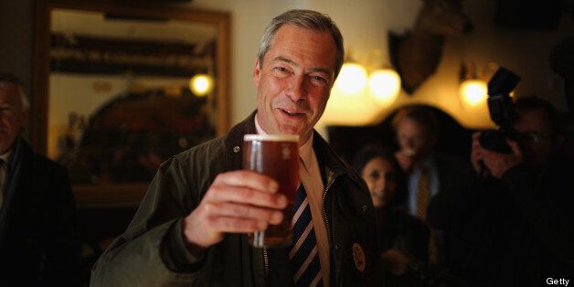 SOUTH SHIELDS, ENGLAND - APRIL 30: UK Independence Party (UKIP) Leader Nigel Farage enjoys a pint of beer after canvassing with the party?s local candidate for South Shields on April 30, 2013 in South Shields, England. The UK Independence party leader, Nigel Farage, said that his party faced 'one or two teething problems' with its 17000 candidates for Thursday's local elections after the suspension of UKIP candidate Alex Wood, who was photographed making a Nazi salute. (Photo by Christopher Furlong/Getty Images)