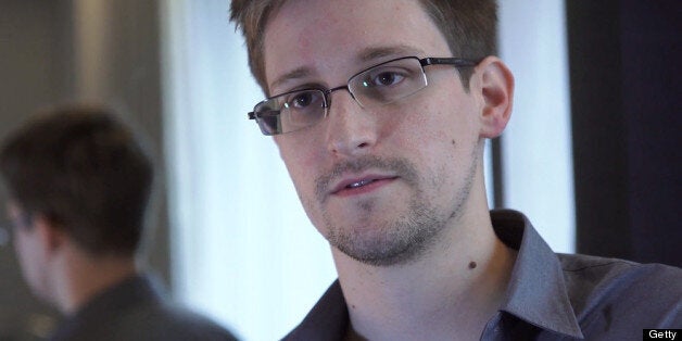 HONG KONG - 2013: In this handout photo provided by The Guardian, Edward Snowden speaks during an interview in Hong Kong. Snowden, a 29-year-old former technical assistant for the CIA, revealed details of top-secret surveillance conducted by the United States' National Security Agency regarding telecom data. (Photo by The Guardian via Getty Images)