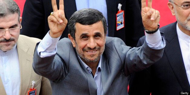 Iran's President Mahmud Ahmadinejad waves as he enters to the National Assembly before Nicolas Maduro Presidential inauguration in Caracas on April 19, 2013. AFP PHOTO / LEO RAMIREZ (Photo credit should read LEO RAMIREZ/AFP/Getty Images)