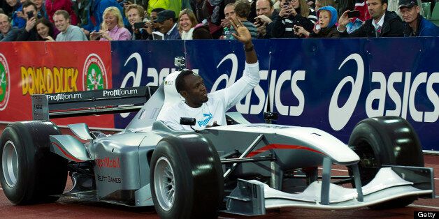 Usain Bolt greets the crowd during the Bislett Games