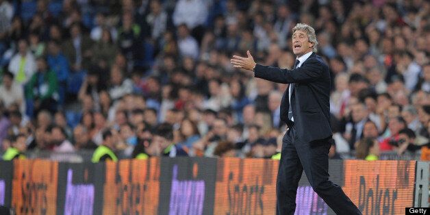 MADRID, SPAIN - MAY 08: Malaga CF head coach Manuel Pellegrini reacts during the La Liga match between Real Madrid CF and Malaga CF at estadio Santiago Bernabeu on May 8, 2013 in Madrid, Spain. (Photo by Denis Doyle/Getty Images)