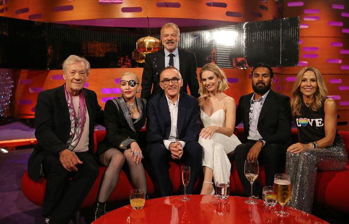 Host Graham Norton with (seated left to right) Sir Ian McKellen, Madonna, Danny Boyle, Lily James, Himesh Patel and Sheryl Crow during the filming for the Graham Norton Show 