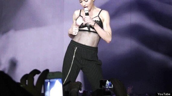 Oops! Madonna bares breast in concert