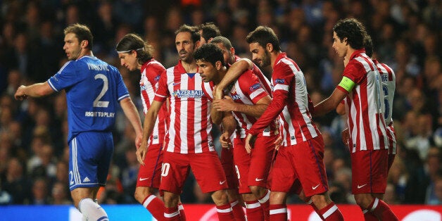 LONDON, ENGLAND - APRIL 30: Diego Costa of Club Atletico de Madrid celebrates his goal with team mates during the UEFA Champions League semi-final second leg match between Chelsea and Club Atletico de Madrid at Stamford Bridge on April 30, 2014 in London, England. (Photo by Clive Rose/Getty Images)