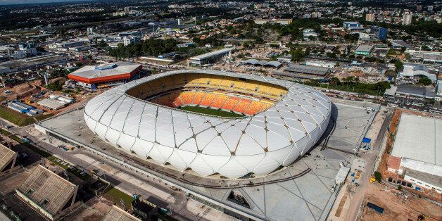 This photo released by Portal da Copa shows Arena da Amazonia stadium on the day of its inauguration in Manaus in the state of Amazonas, Brazil, Sunday, March 9, 2014. Three stadiums still have to be finished, including the one hosting the opener in Sao Paulo in about three months. (AP Photo/Jose Zamith, Portal da Copa)