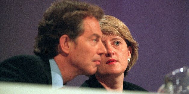 Then Labour Party General Secretary Margaret McDonagh has a quiet word with Tony Blair during the Party's 1998 conference in Blackpool