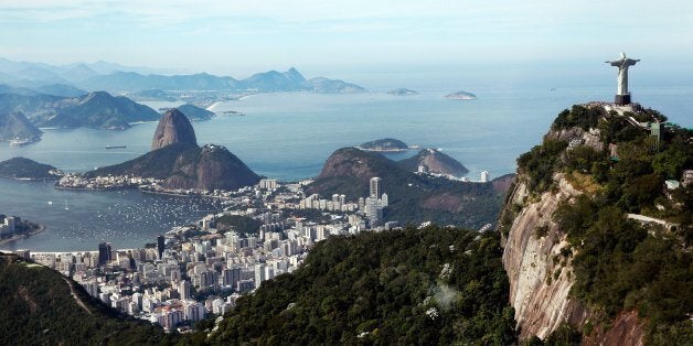 RIO DE JANEIRO, BRAZIL - JULY 07: A general view of the Christ The Redeemer statue atop the Corcovado and Sugarloaf Mountain on July 7, 2014 in Rio de Janeiro, Brazil. (Photo by Jamie Squire/Getty Images)