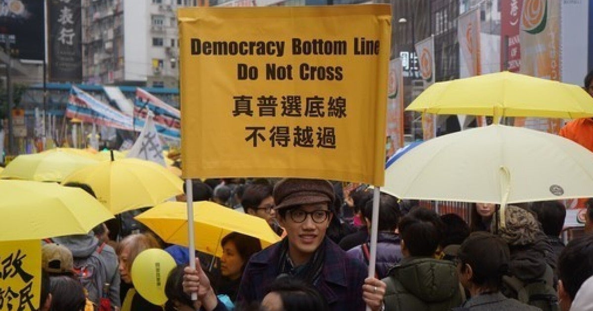 In Pictures: Hong Kong Umbrella Movement Reconvenes as Thousands March